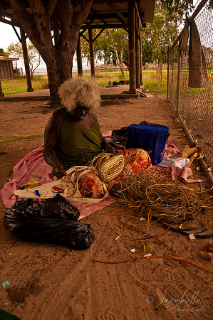 Rosalin weaving a basket